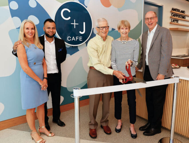 Ribbon cutting ceremony for the opening of the C + J Cafe