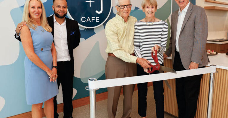 Ribbon cutting ceremony for the opening of the C + J Cafe