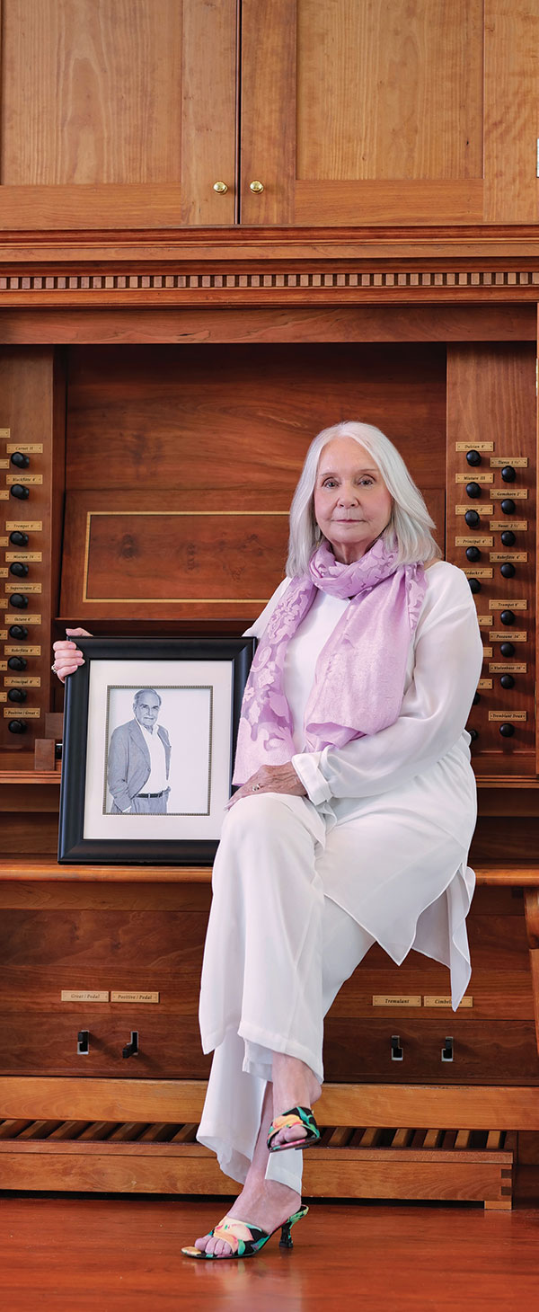 Dolly Bodick Korest with a photo of Alan Korest